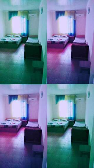 Гостевой дом Розовый домик Саки Трехместный номер «Комфорт» с душем-3